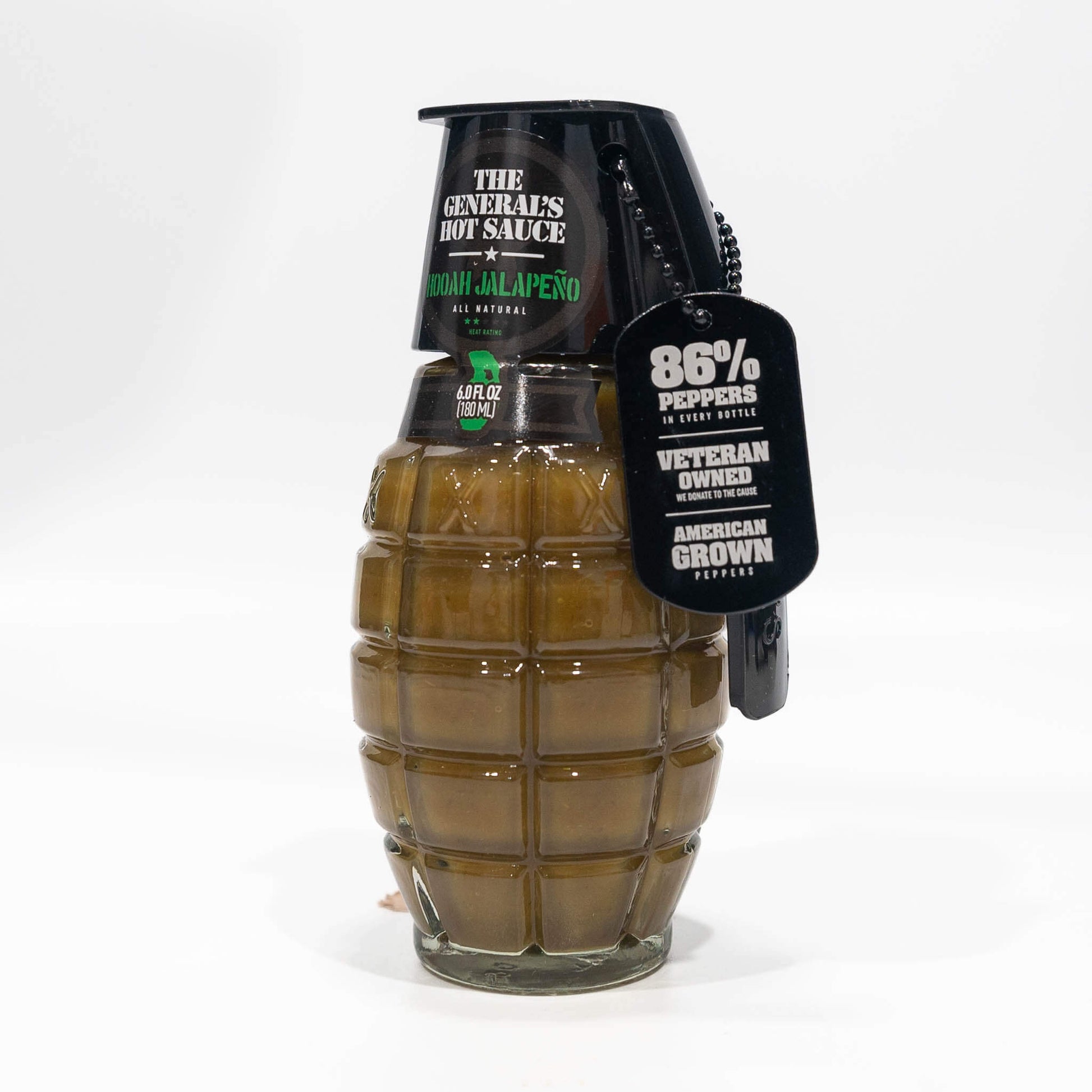 Front angle view of The General's Hooah Jalapeño hot sauce bottle, showcasing the 'All Natural' label and 86% peppers content, emphasizing its veteran-owned and American-grown quality.